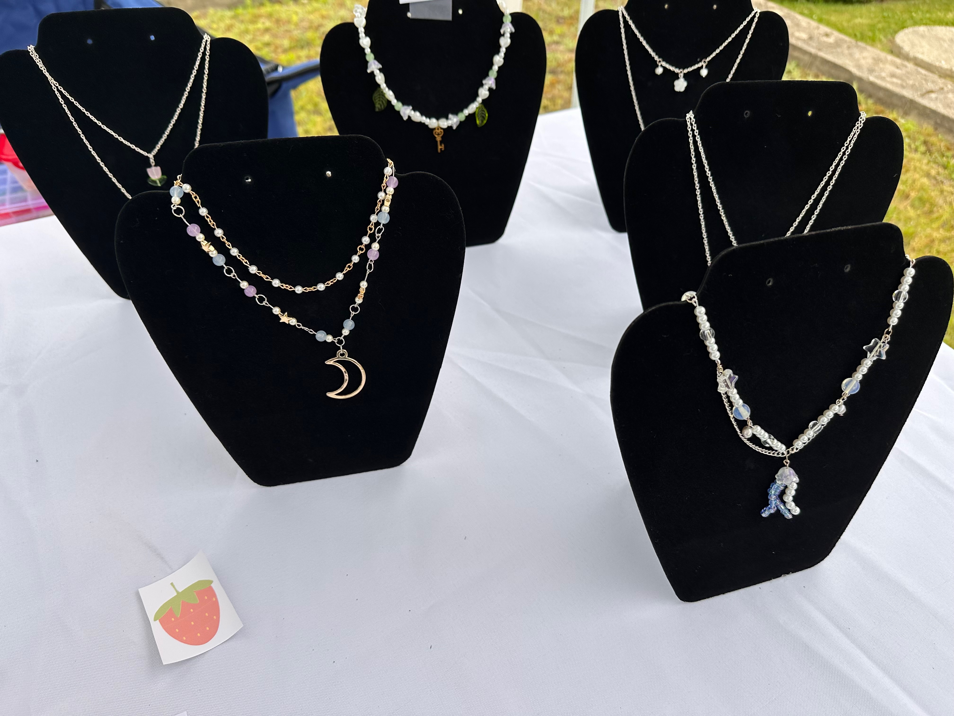 Elegant necklaces on display
