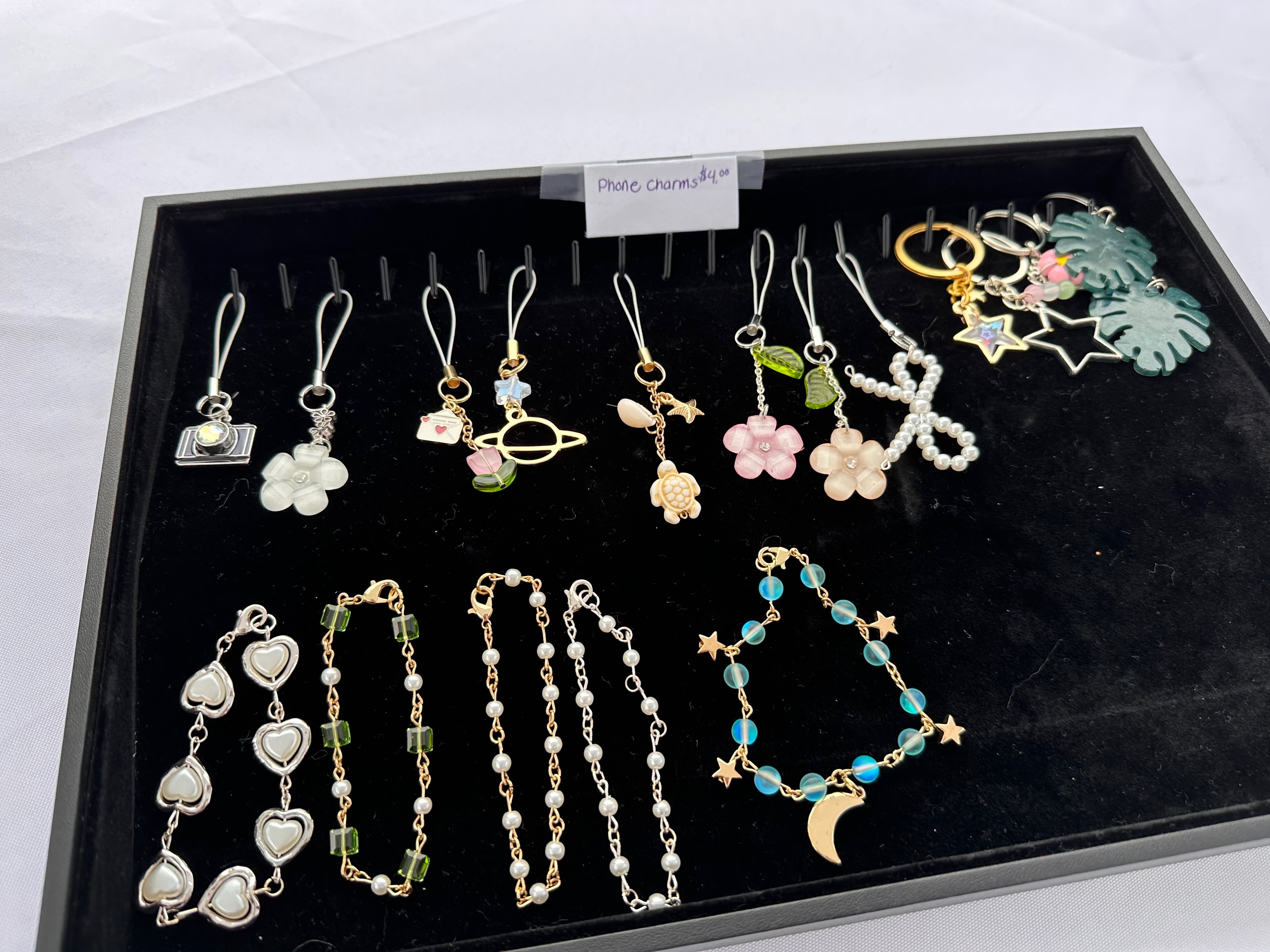 Phone charms on display